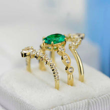 Load image into Gallery viewer, 14K Yellow Gold Oval Emerald Moissanite Halo Engagement Ring with Two Eternity Rings Set