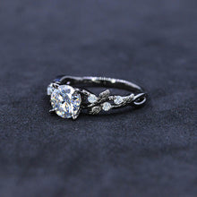Load image into Gallery viewer, Round Brilliant Cut Moissanite Floral Black Gold Engagement Ring