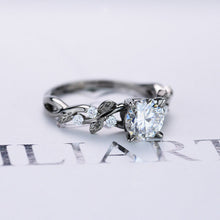 Load image into Gallery viewer, Round Brilliant Cut Moissanite Floral Black Gold Engagement Ring
