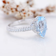 Load image into Gallery viewer, 4 Carat Pear Cut Aquamarine Hidden Halo Gold Engagement Ring
