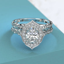 Load image into Gallery viewer, 1.5 Carat Oval Moissanite Halo Engagement Ring Eternity Ring Set

